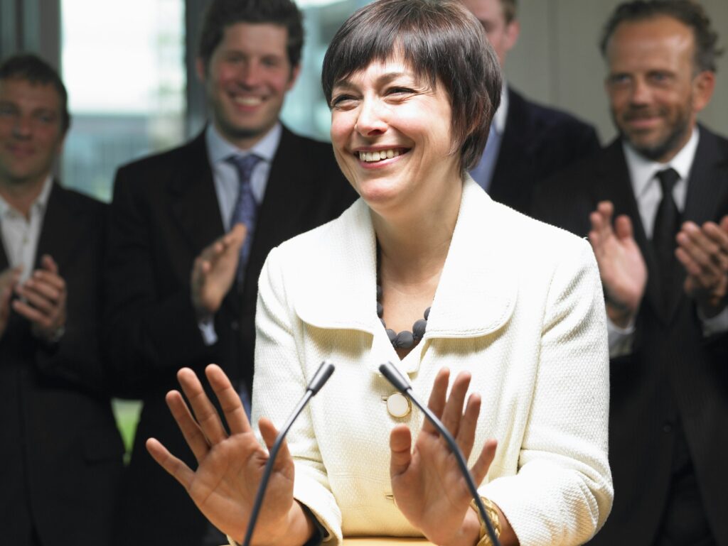 Business woman giving a conference